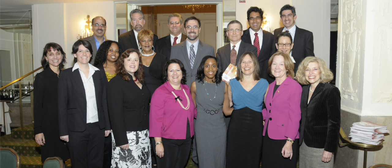 A group of NELP staff pose for the 2008 portrait